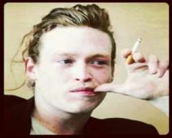 Caleb Landry Jones smoking